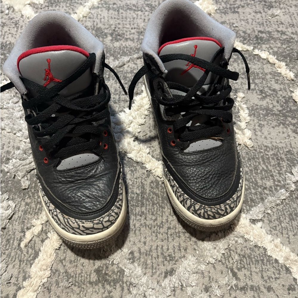 Kids Black and Red Nike Sneakers